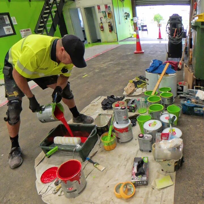 Racers racing on the track marked by marking service providers